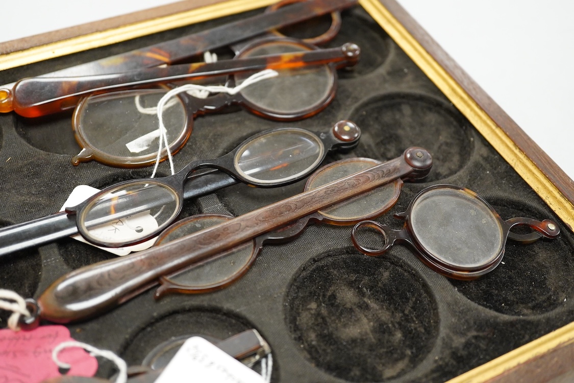 A pair of 18th-century tortoiseshell framed temple spectacles, the silver hinges with maker’s mark ‘CR,’ (one arm shortened) various tortoiseshell and simulated tortoiseshell lorgnettes, a monocle and a pair of scissor s